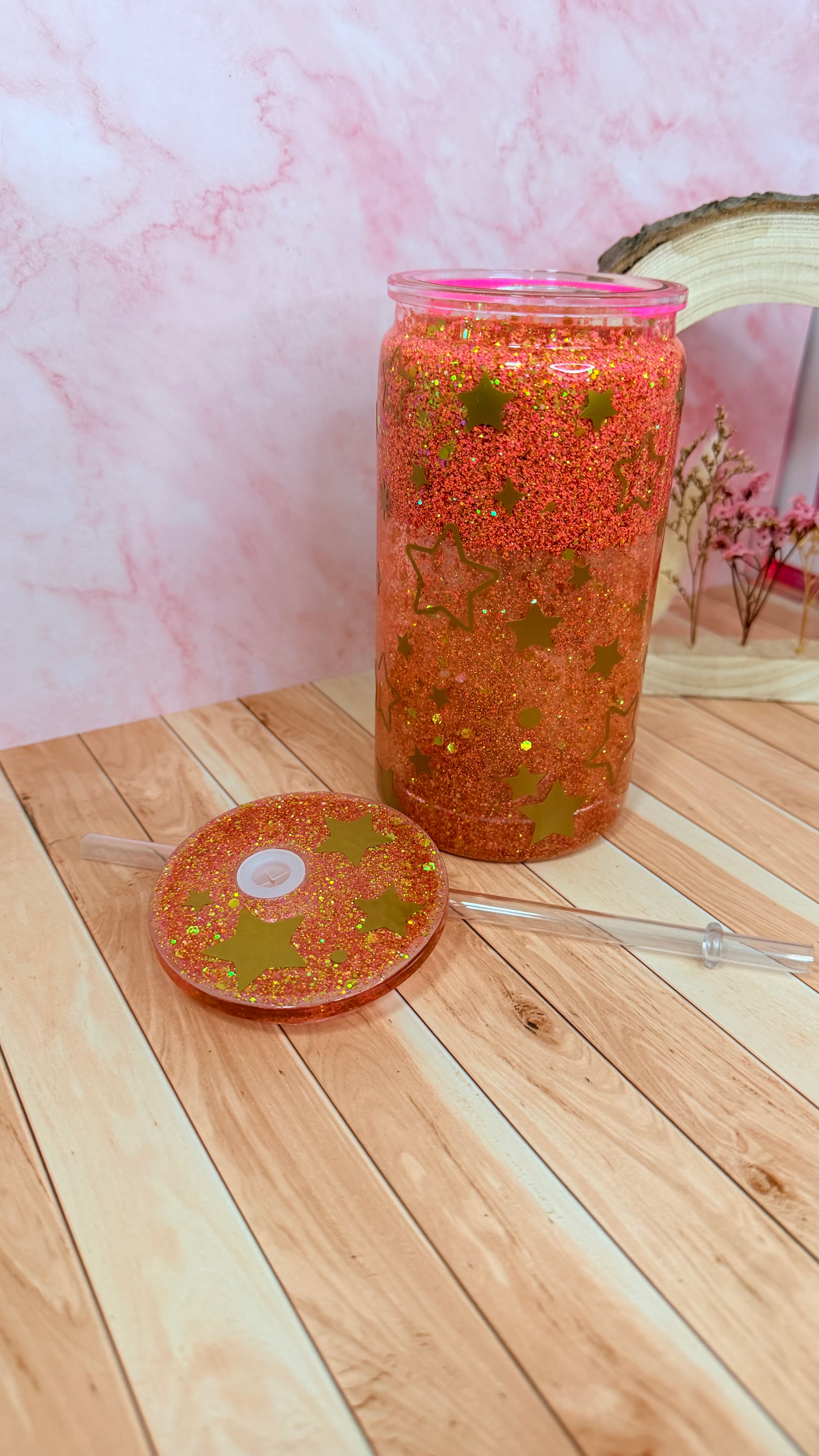 Vaso snowglobe naranja de estrellas