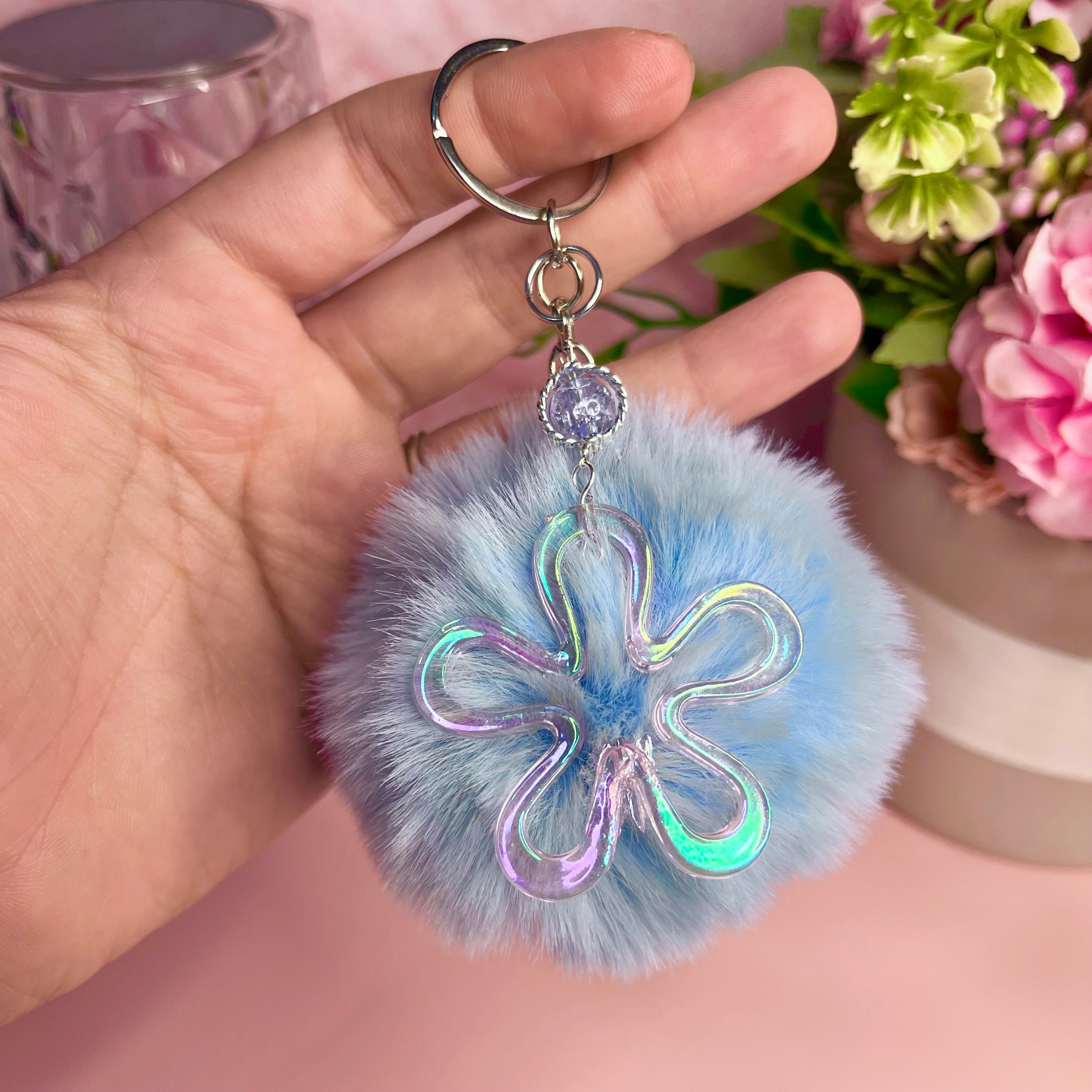 Llavero pompón azul flor