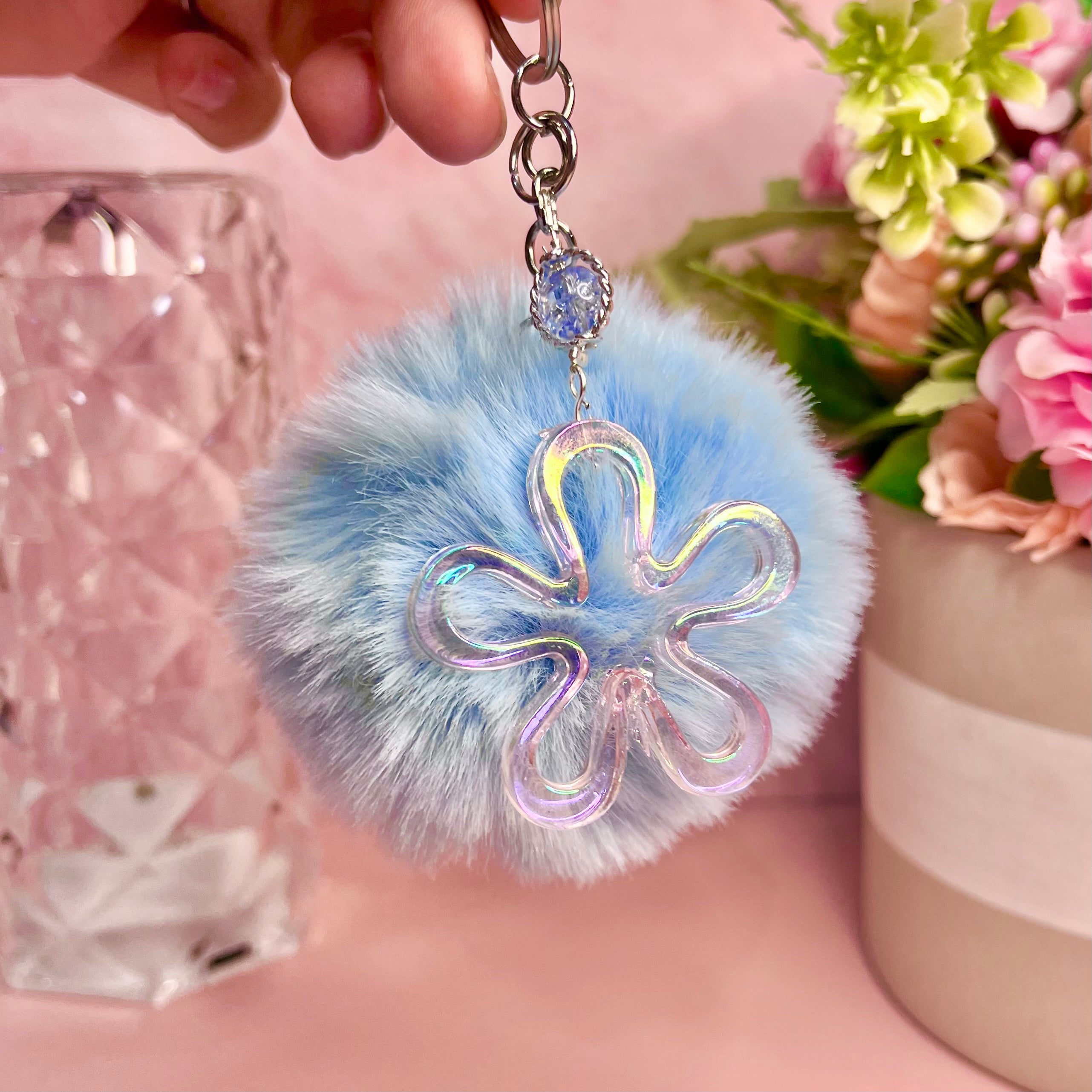 Llavero pompón azul flor