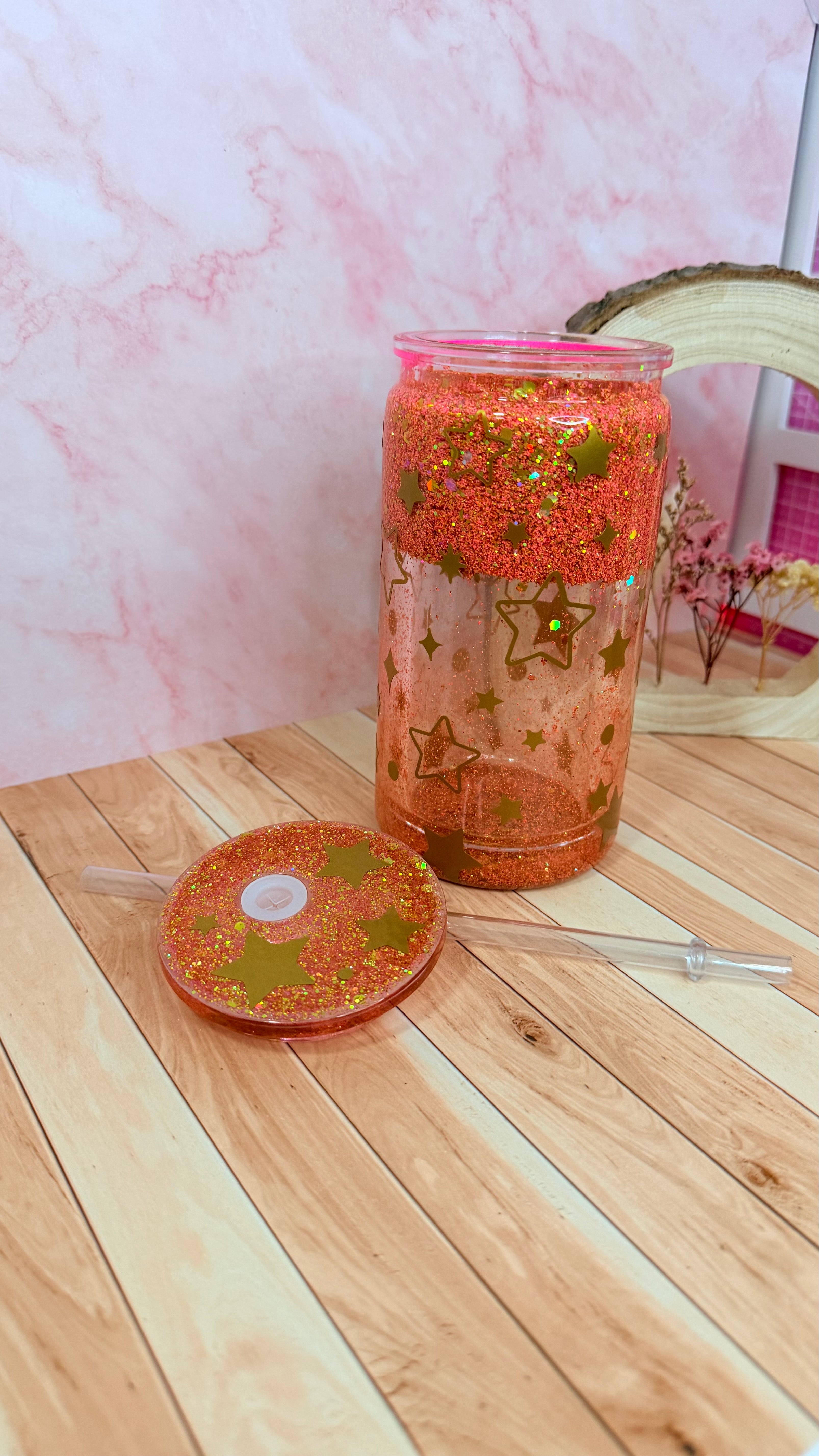 Vaso snowglobe naranja de estrellas
