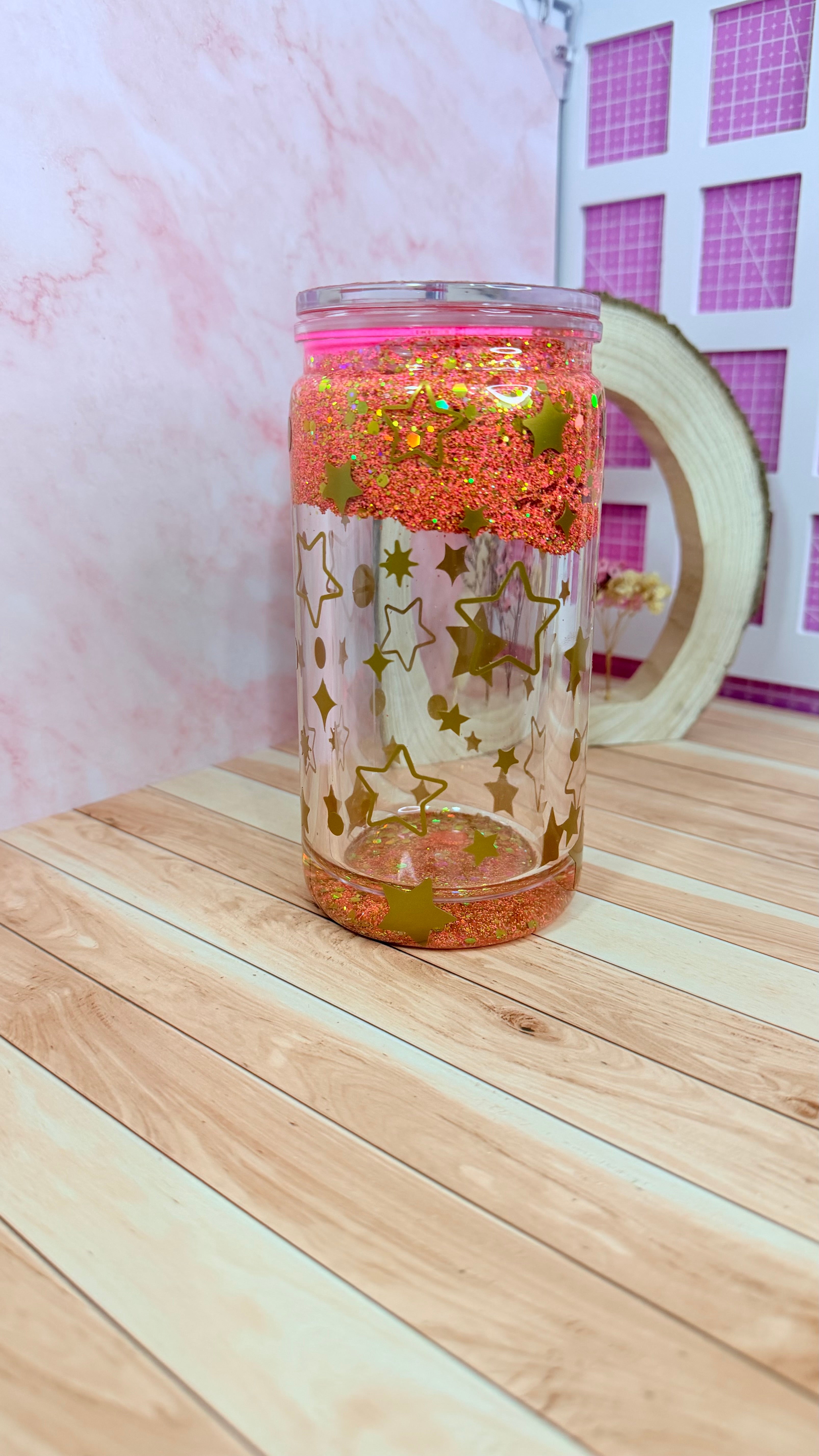 Vaso snowglobe naranja de estrellas